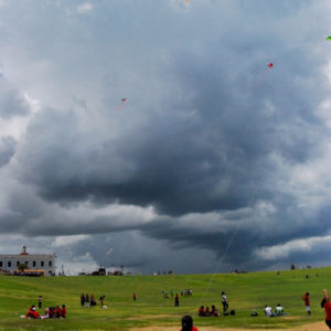 Flying kites at the field of Fortress El Morro